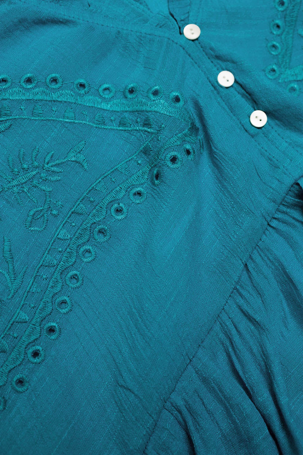Shirred crop top with embroidery in blue