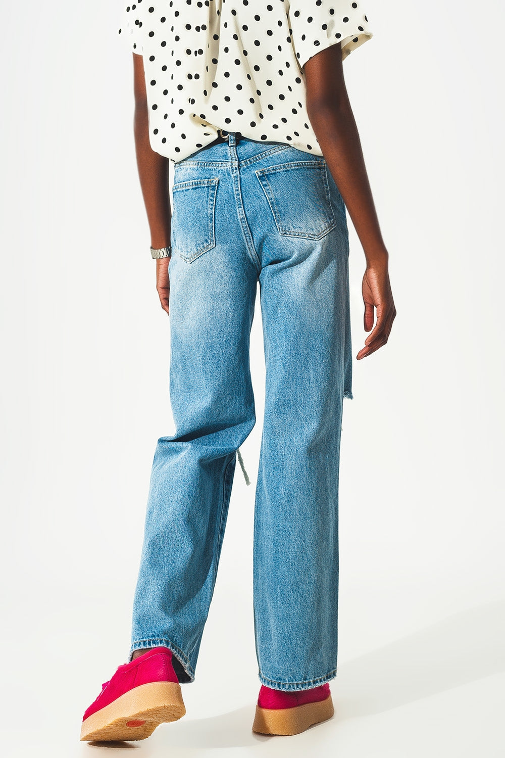 Straight jean in medium wash with rip and split hem - Denim