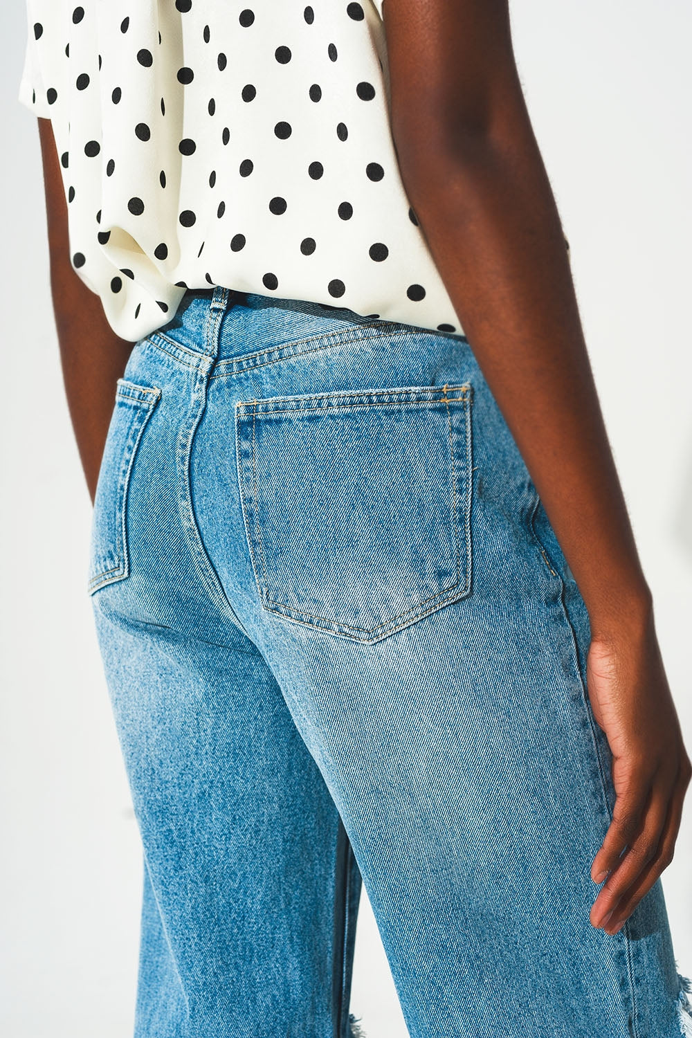 Straight jean in medium wash with rip and split hem - Denim