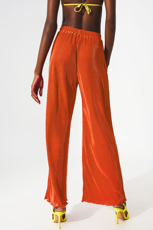 Satin pleated wide leg pants in orange - trousers