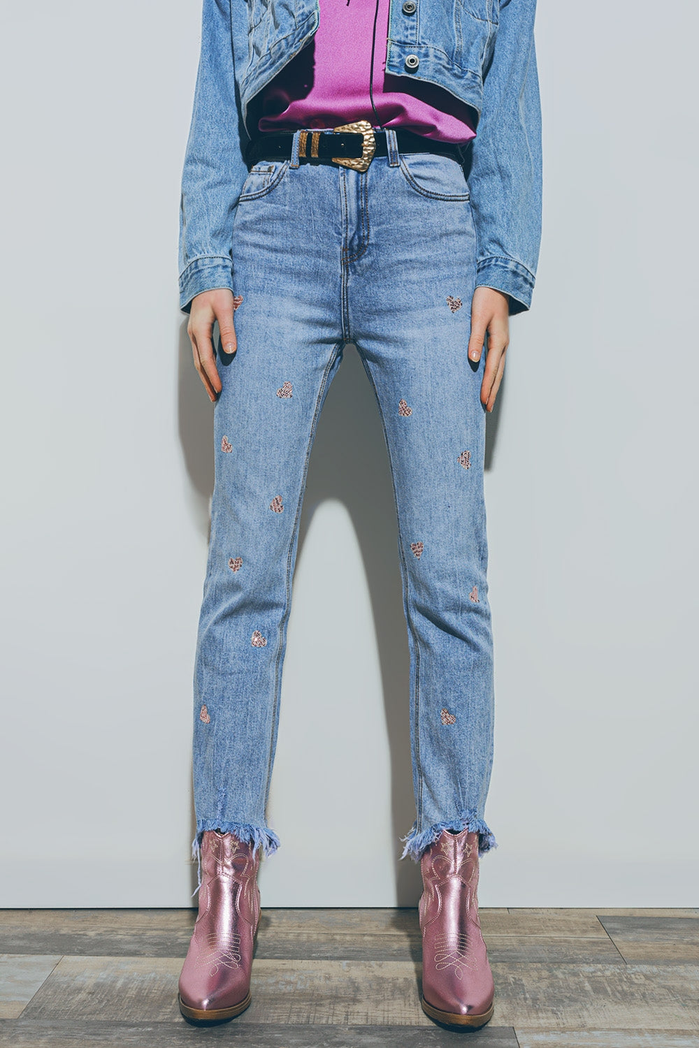 Heart Embellished Jeans with teared hem in Medium Wash - Denim