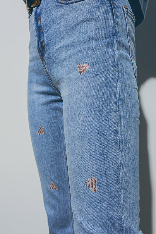 Heart Embellished Jeans with teared hem in Medium Wash - Denim