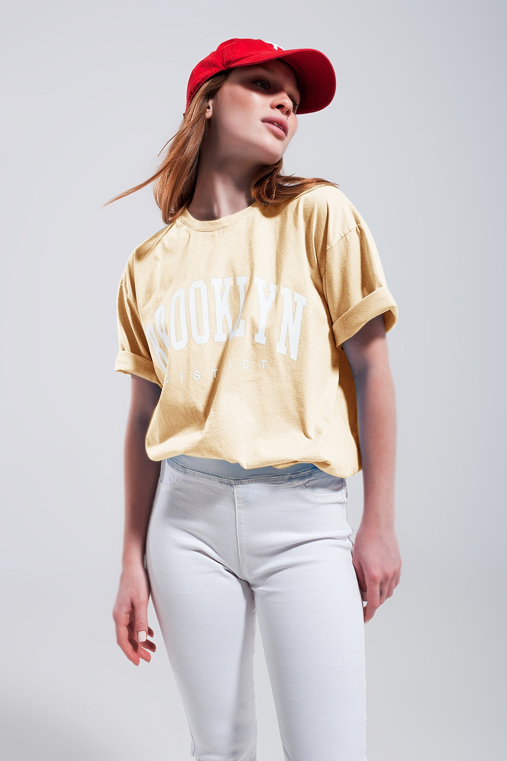 T-Shirt with Brooklyn District Text in yellow - top