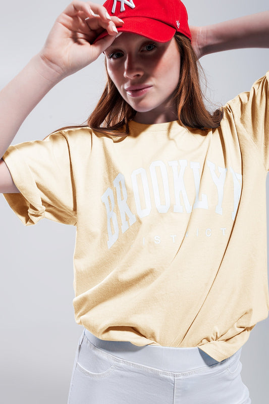 T-Shirt with Brooklyn District Text in yellow - top