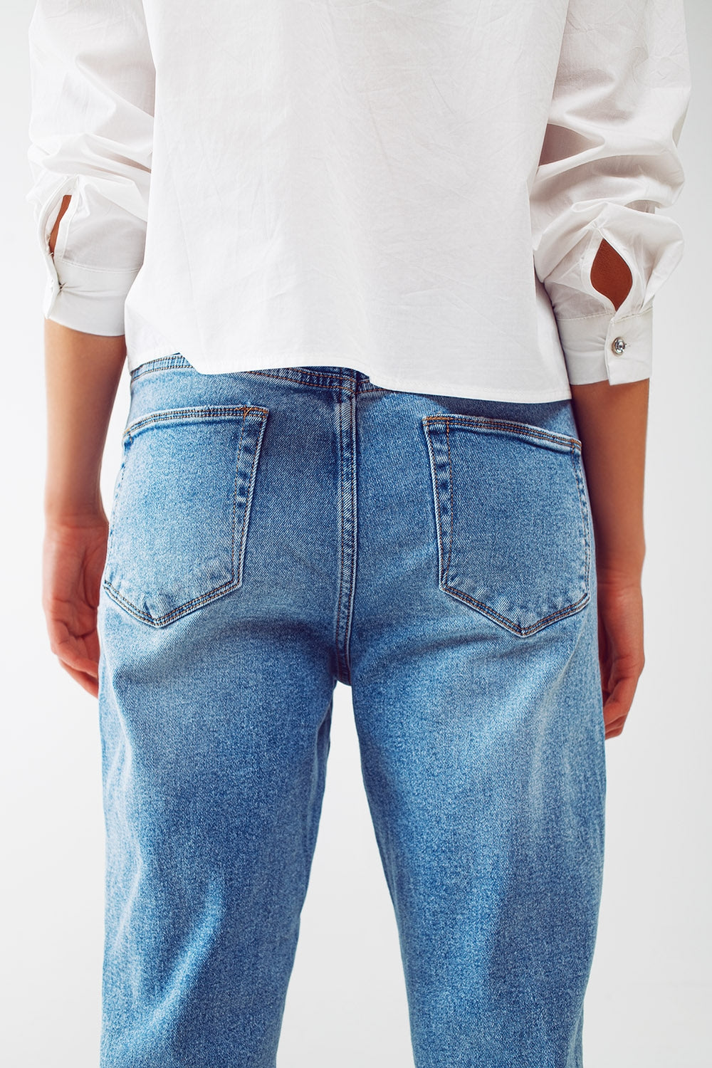 Ripped knee straight leg jeans in light blue wash - Denim