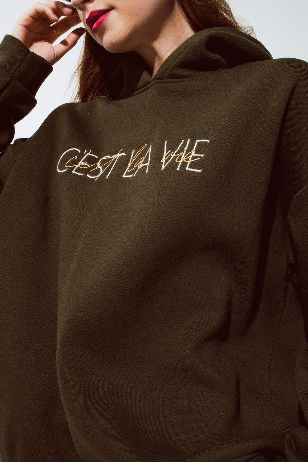 Khaki color hoodie with embroidered Cest La Vie text - jumper