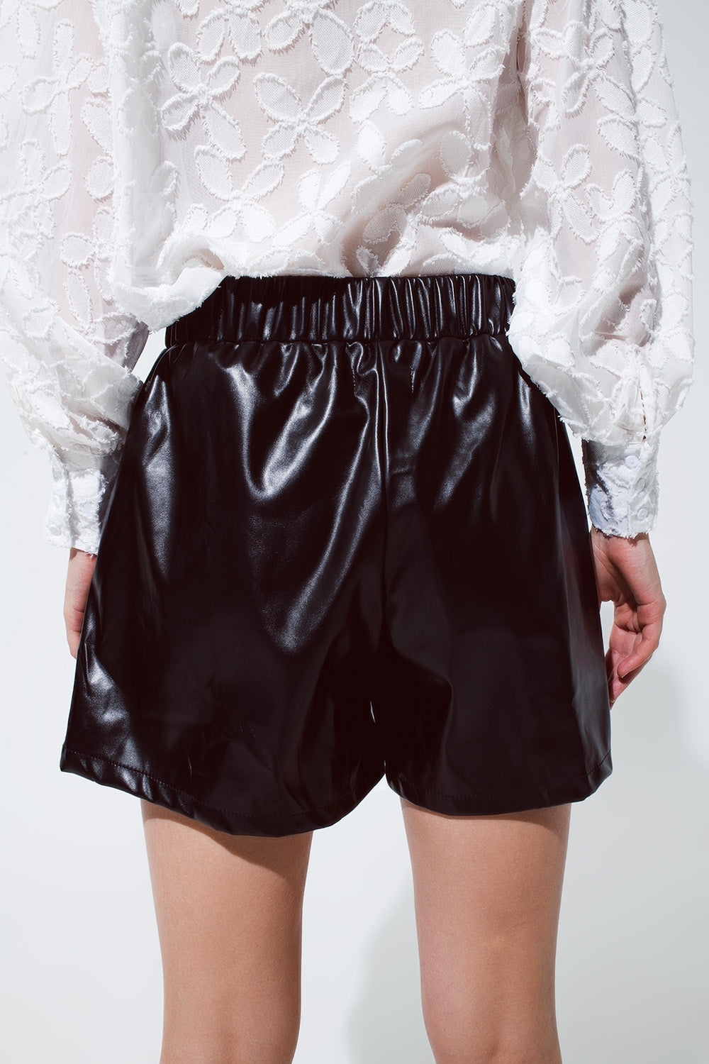 Black faux leather shorts - trousers
