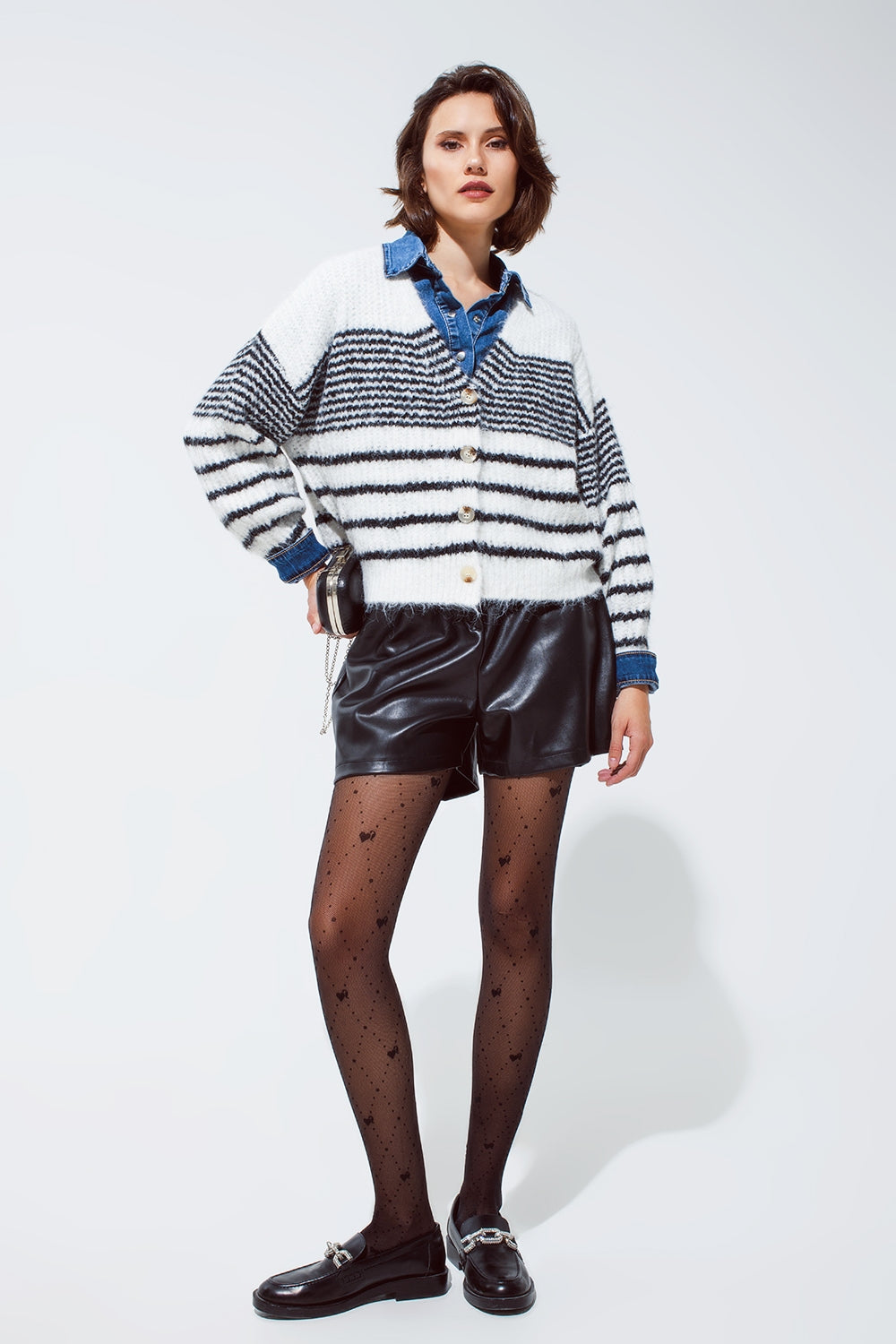 Faux leather oversized shorts with pleat down the front and pockets in black - trousers