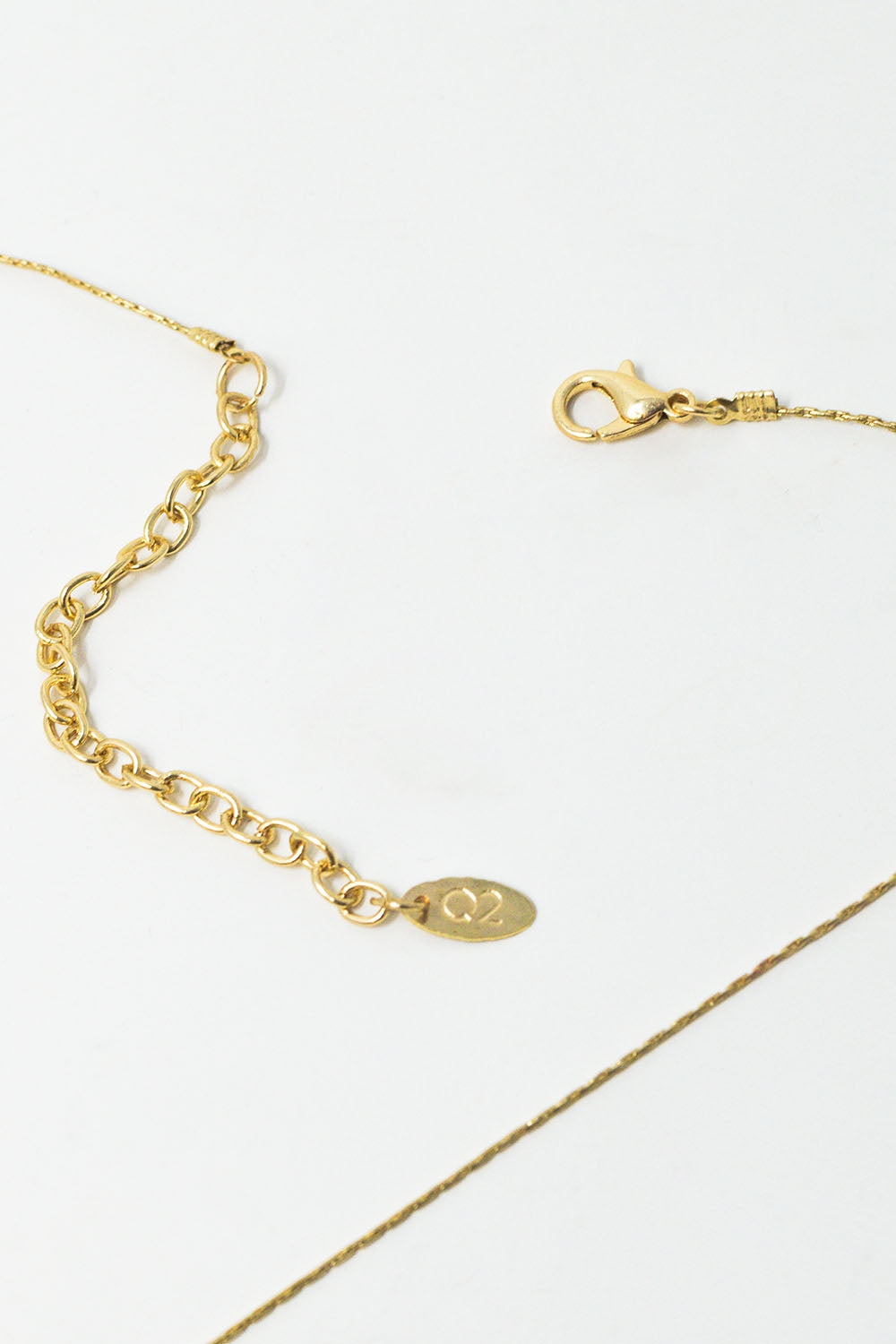 Long Gold Necklance with golden beads throughout and Long golden Tassle