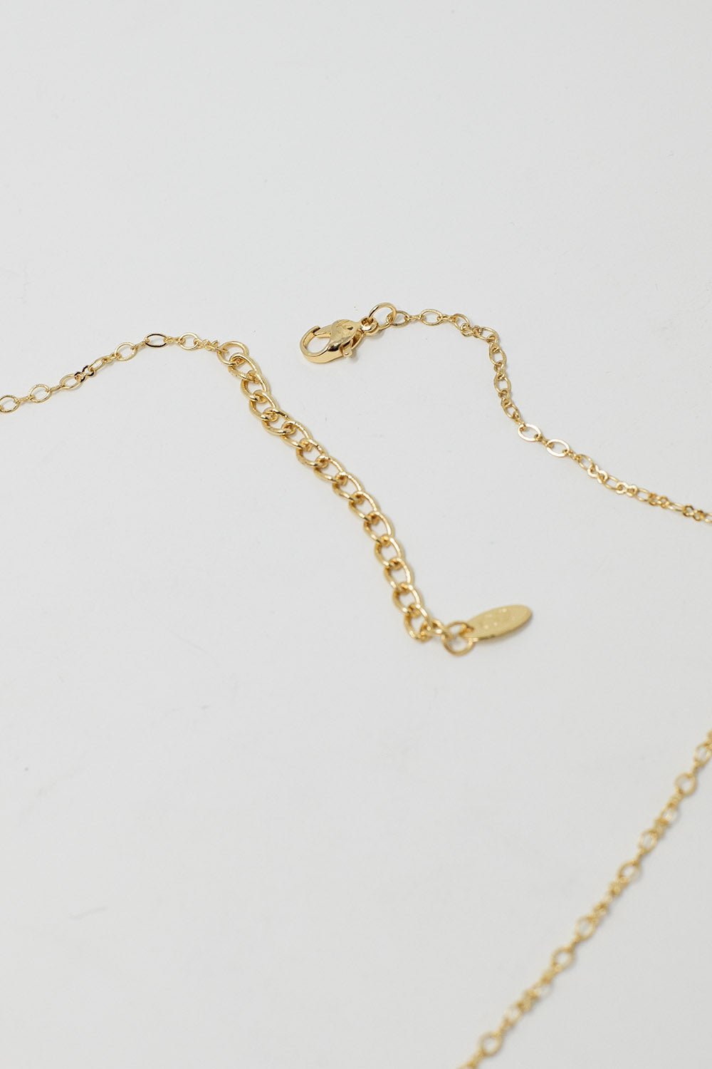 Golden Necklace with Star Charm and Green Bead