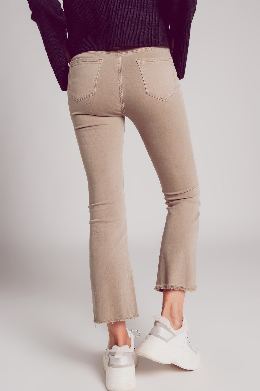 Flare jeans with raw hem edge in beige - Coloured Jeans