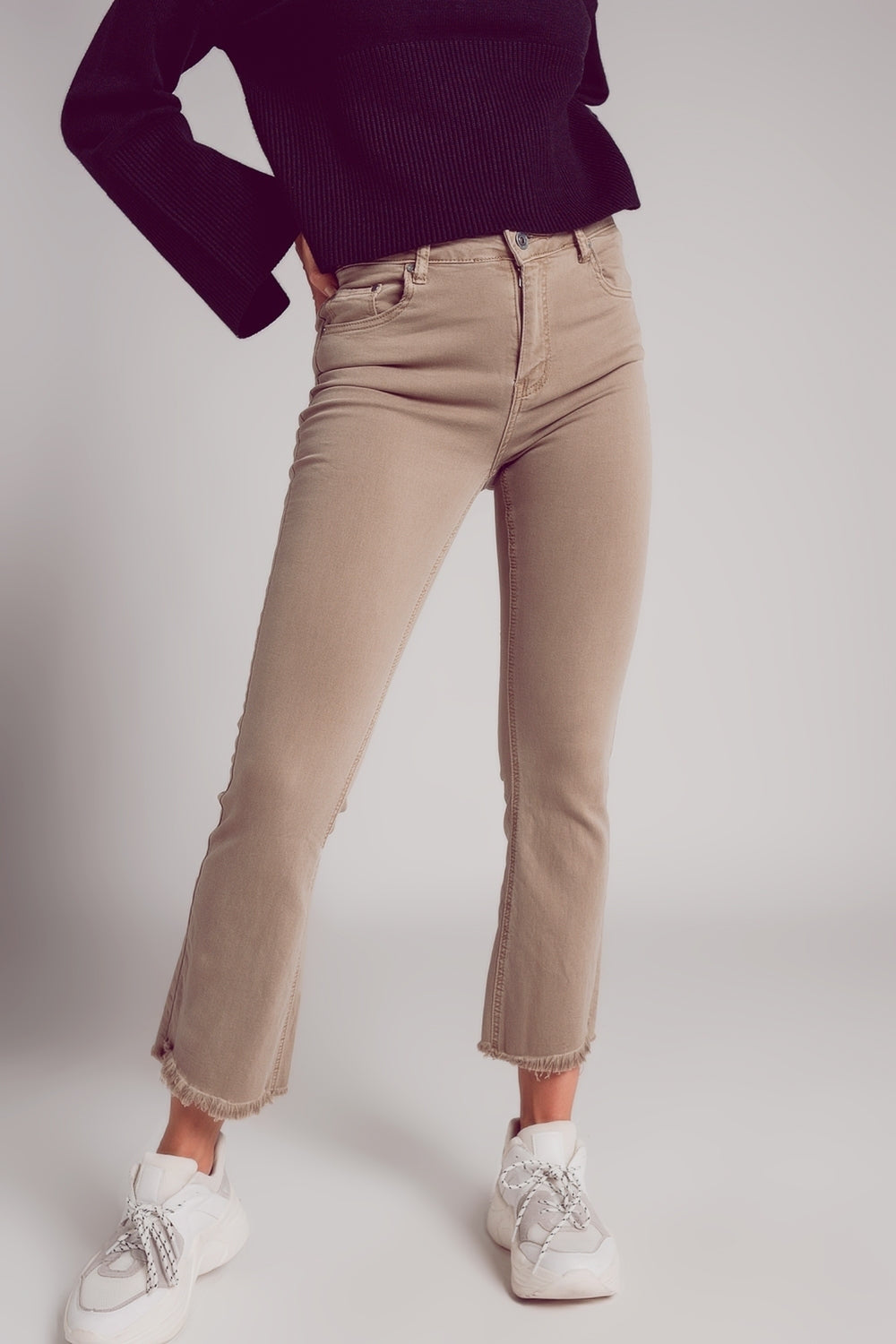Flare jeans with raw hem edge in beige