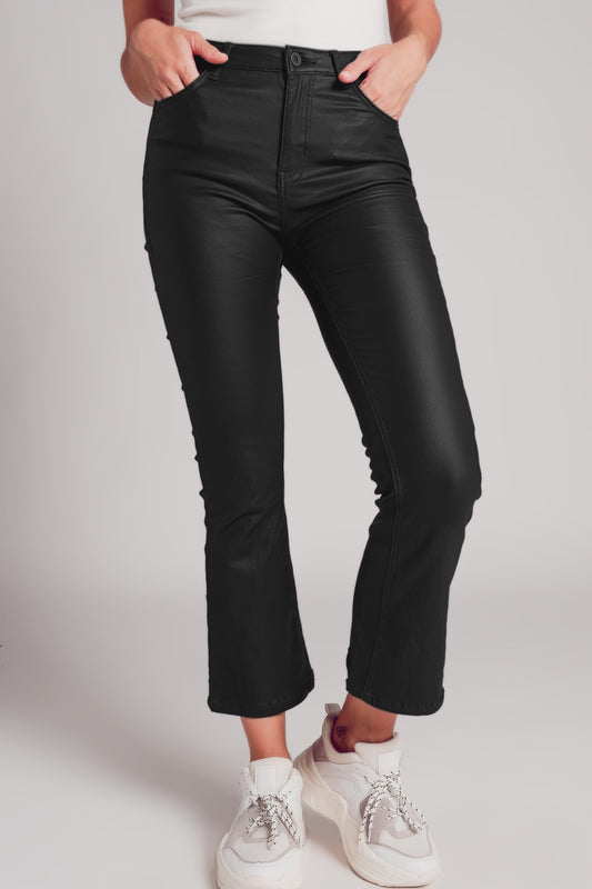 Stretch faux leather flare pants in black - trousers