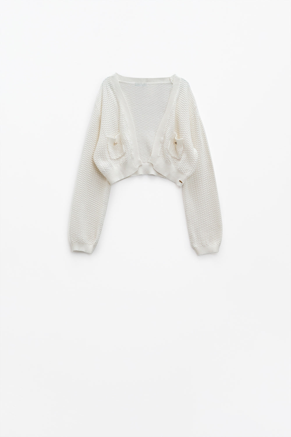 White long sleeve cardigan with button closure and front pockets