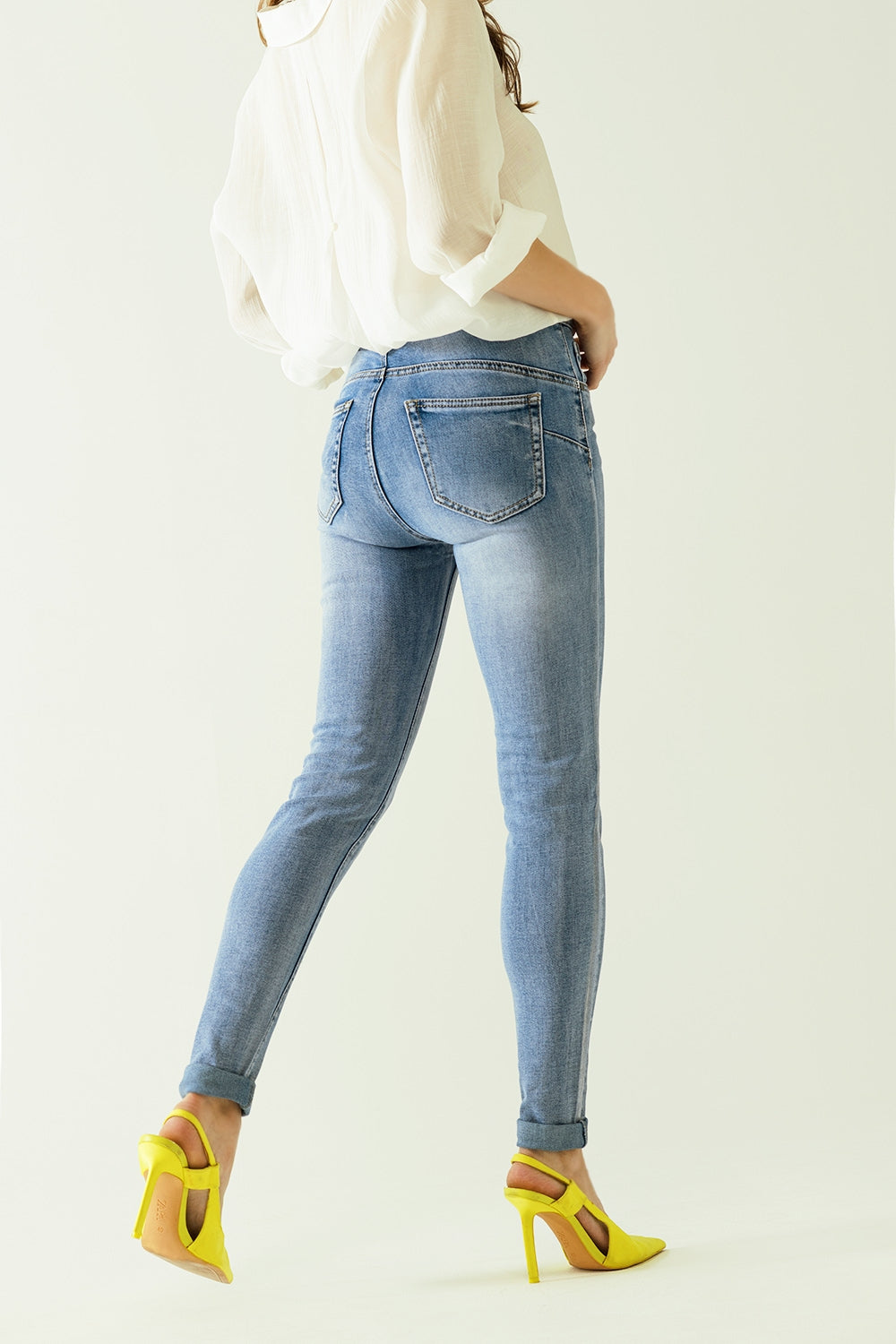 High-waisted jeans with five pockets with silver powder-coated effect - Denim