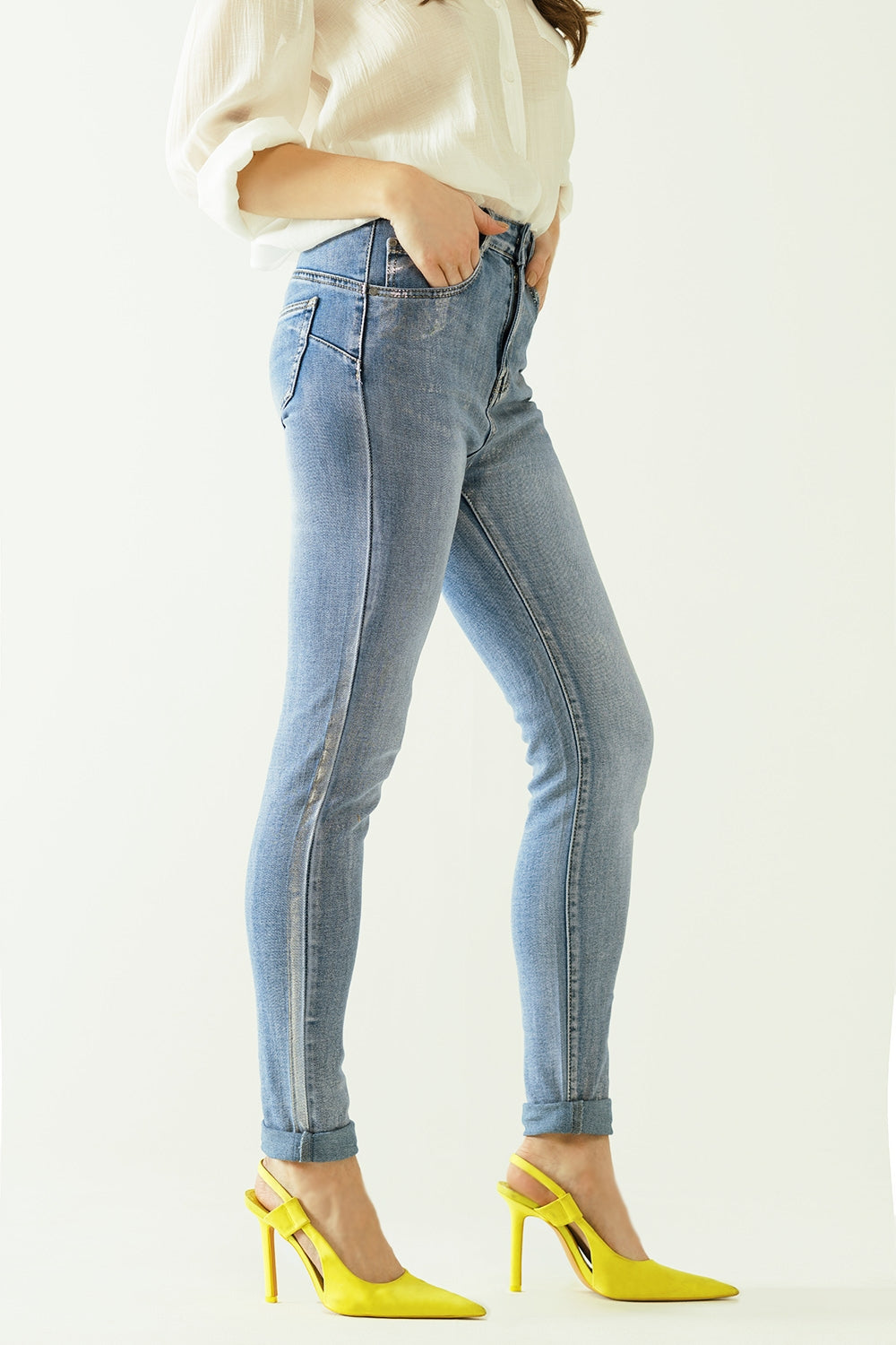 High-waisted jeans with five pockets with silver powder-coated effect - Denim
