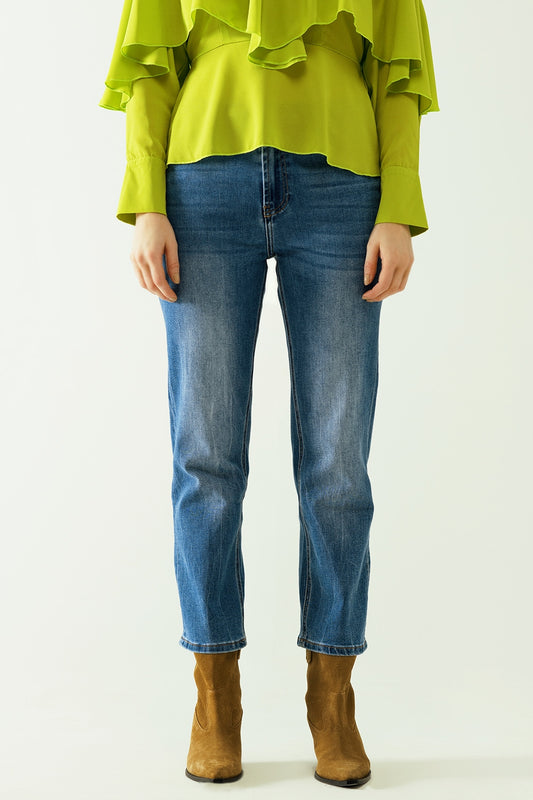 Basic straight jeans with five pockets and frontal metalic button closure - Denim