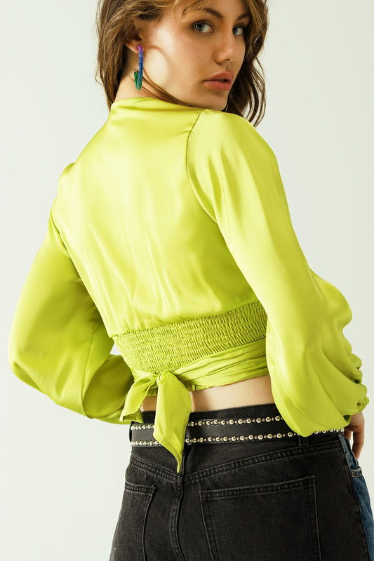 Short green crop top with long and wide sleeves - top