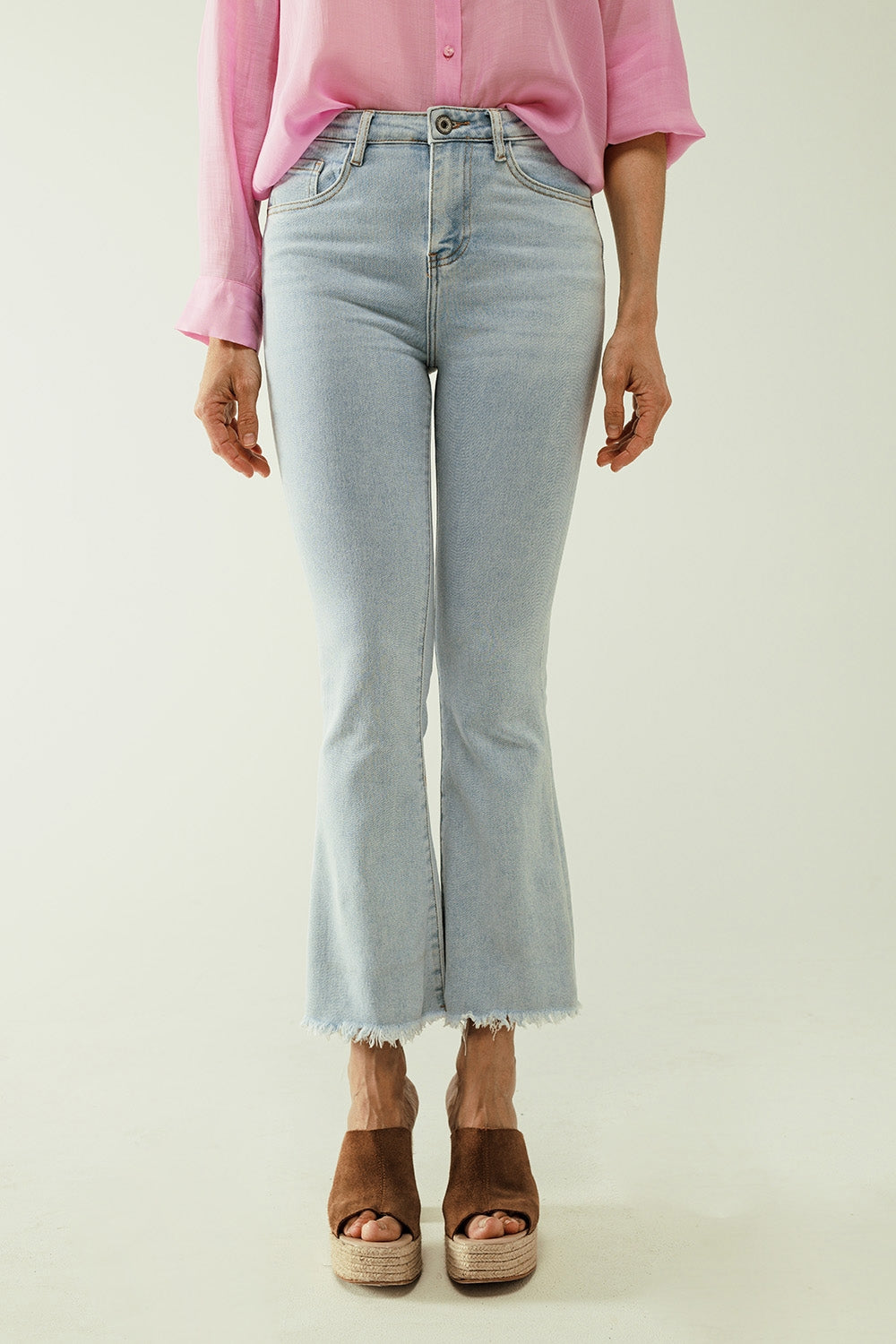 Flared light blue jeans with five pockets and seamless finish - Denim