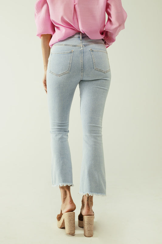 Flared light blue jeans with five pockets and seamless finish - Denim