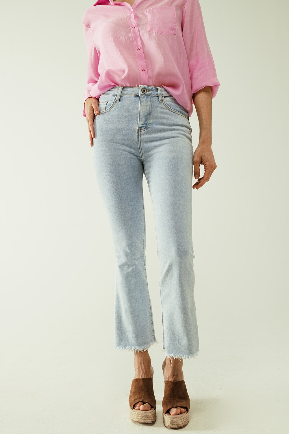 Flared light blue jeans with five pockets and seamless finish - Denim
