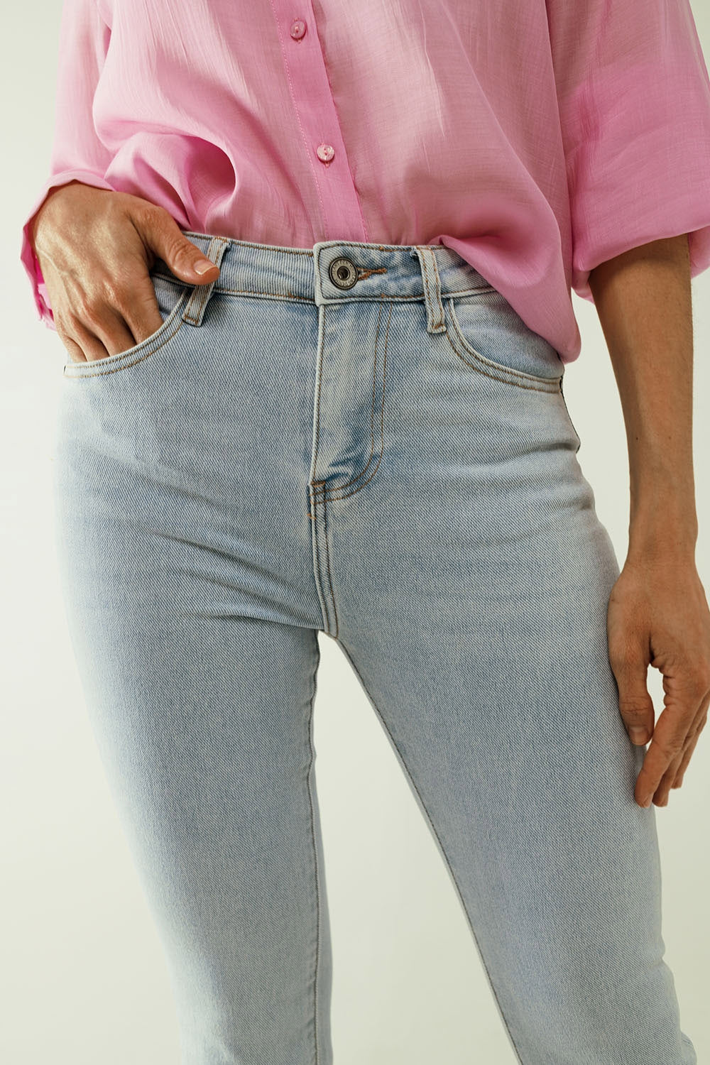 Flared light blue jeans with five pockets and seamless finish - Denim