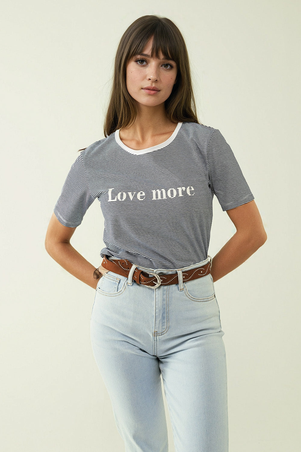 White T-shirt with black stripes and Love More texted - top