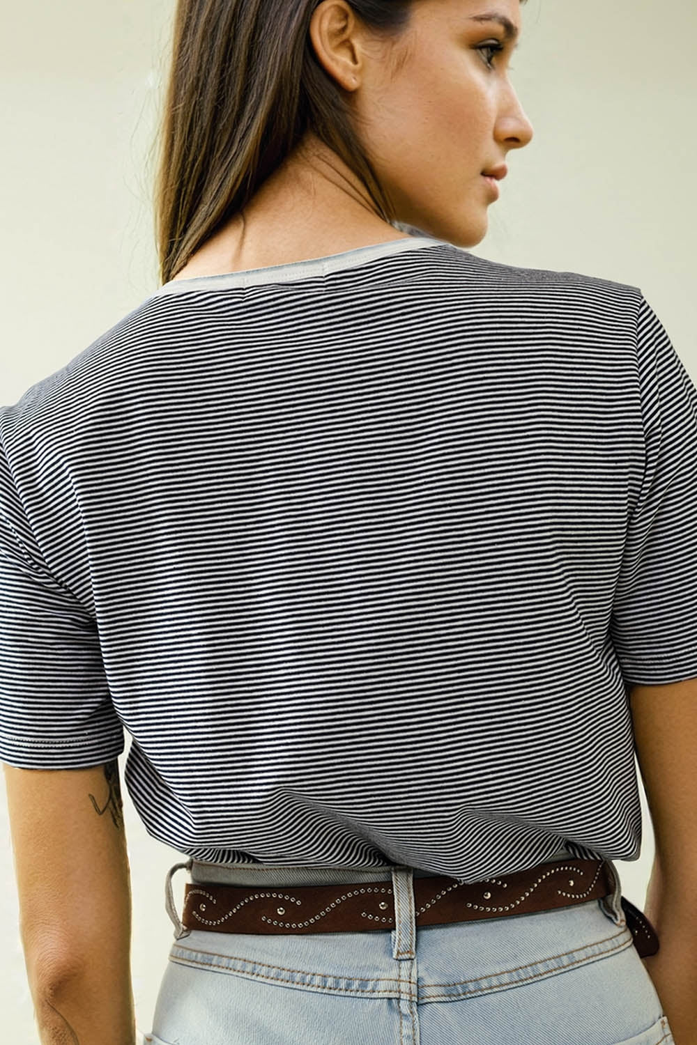 White T-shirt with black stripes and Love More texted - top