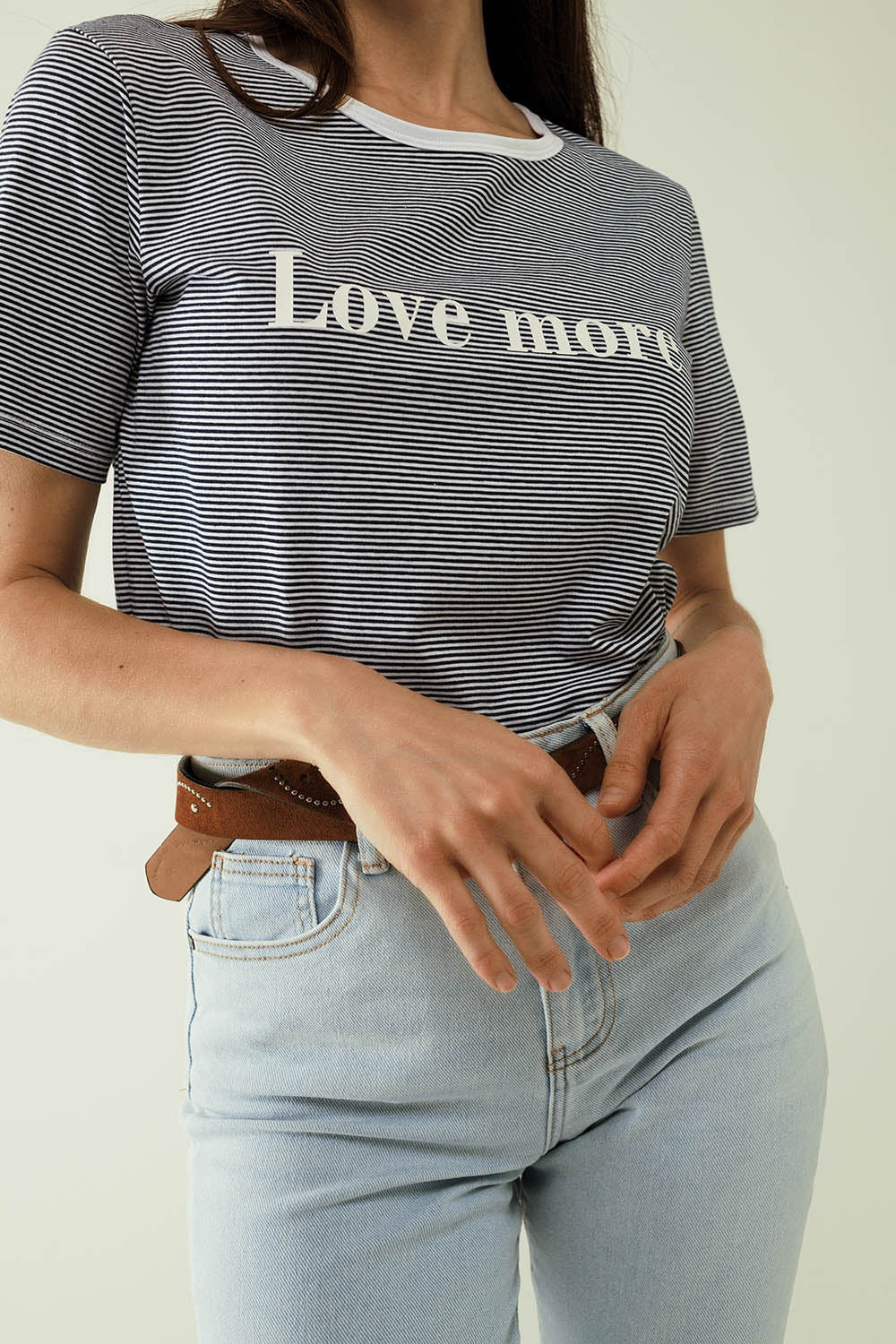 White T-shirt with black stripes and Love More texted - top