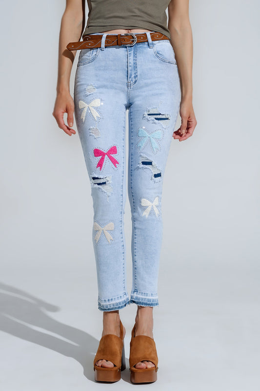 Light Blue Skinny Jeans With Bow ties and Ripped Holes - Denim