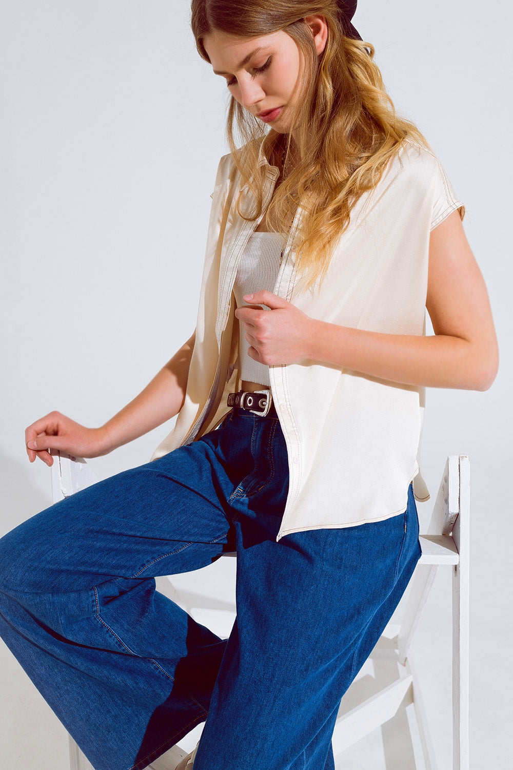 Sleeveless Blouse with pollo collar in beige - Shirts