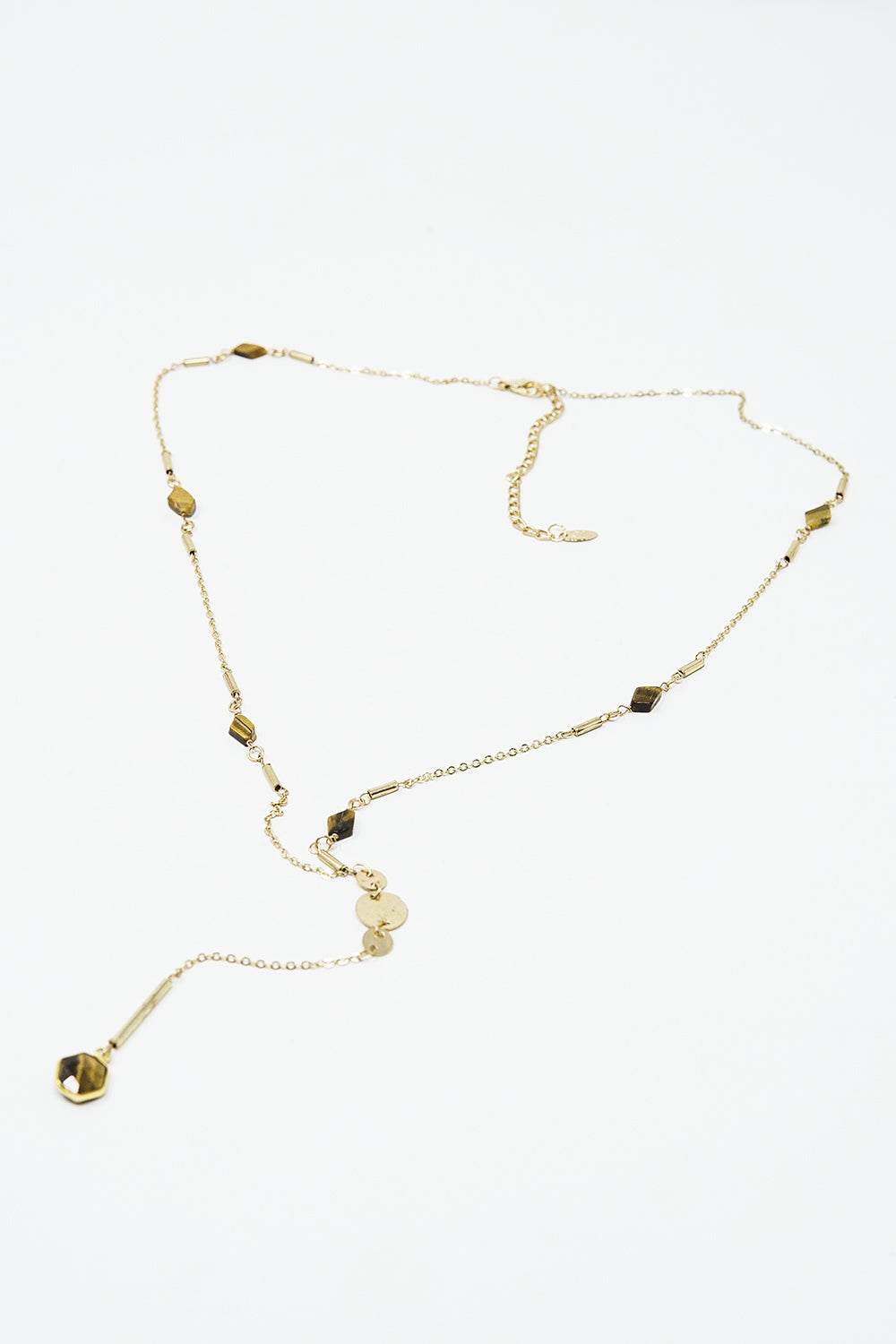 Golden necklace with stone detail and pendant