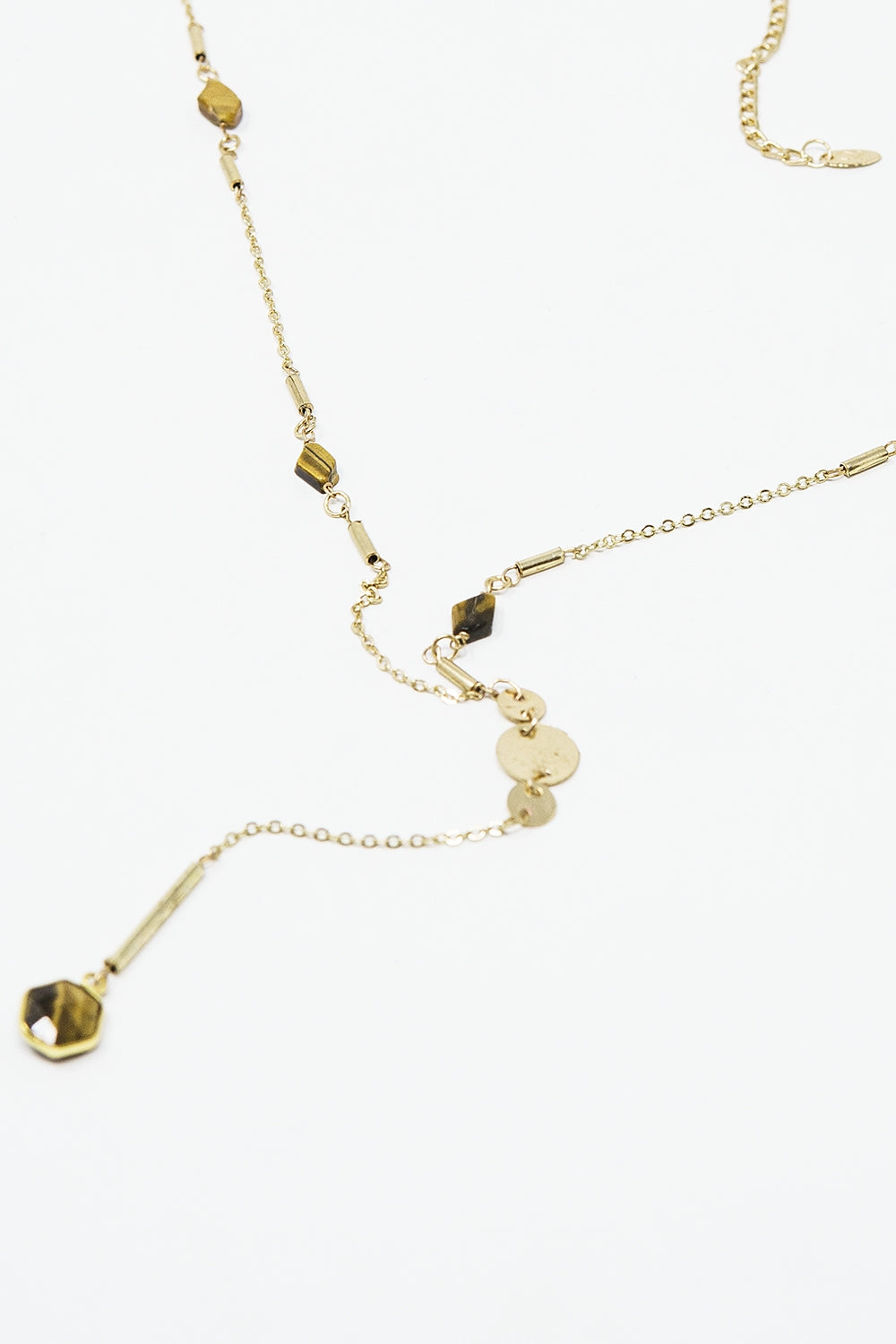 Golden necklace with stone detail and pendant