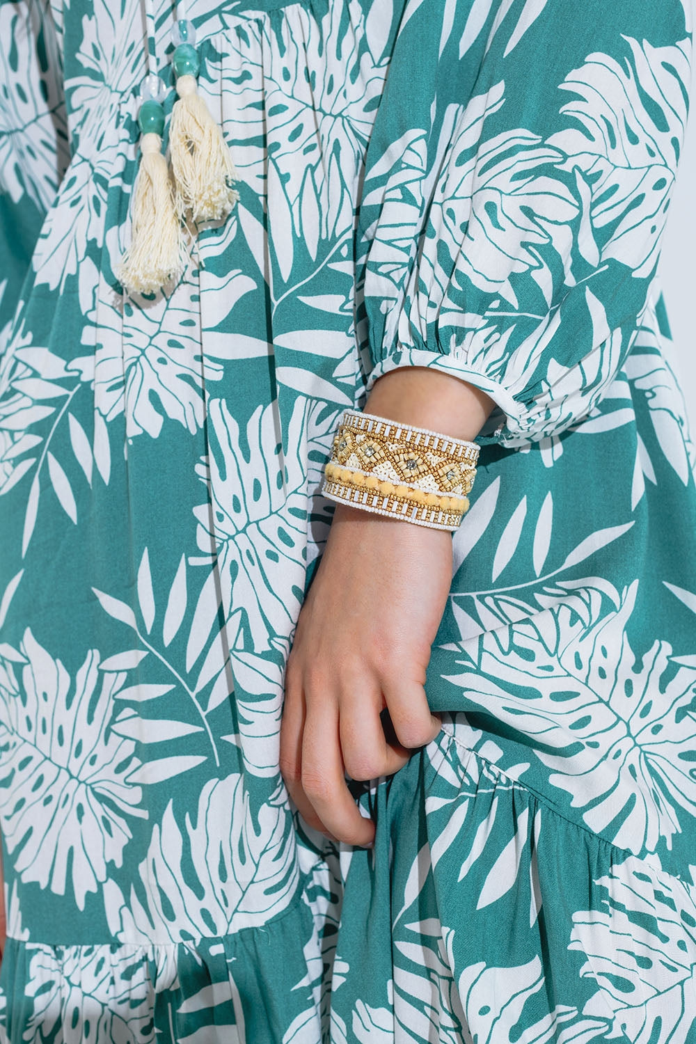 Cream Open Bracelet With Embellishments In White And Beige