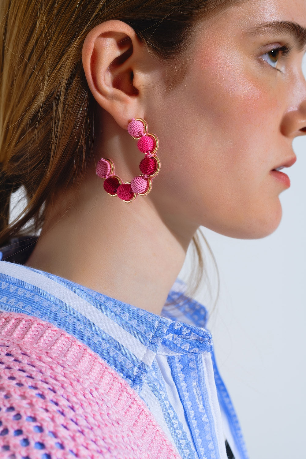 Gold Hoop Earring With Woolen Spheres in Pink and Fuchsia