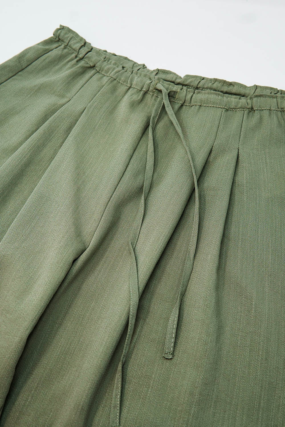 Light Green Relaxed Pants With Drawstring Closing And Side Pockets - trousers