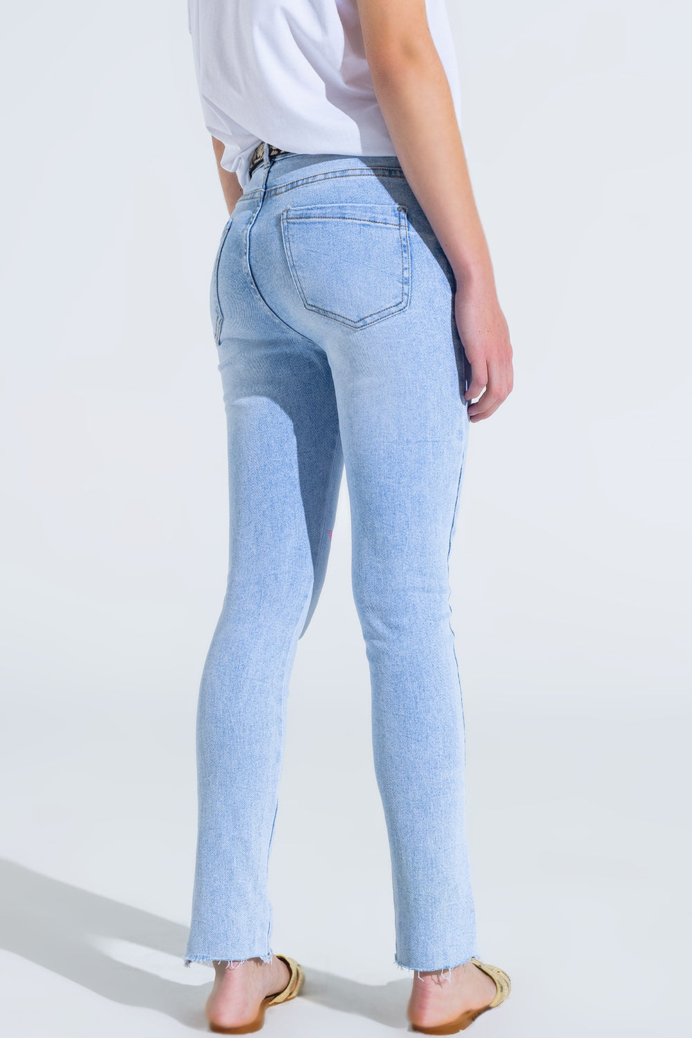 Light Wash Skinny Jeans With Stars On The Legs - Denim