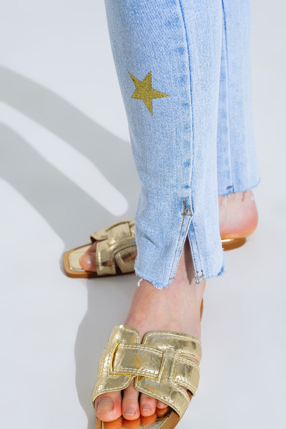 Light Wash Skinny Jeans With Stars On The Legs - Denim