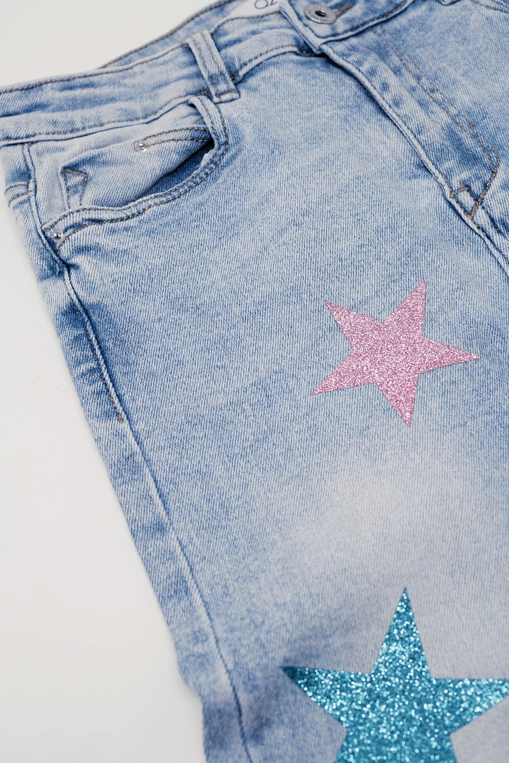 Light Wash Skinny Jeans With Stars On The Legs - Denim