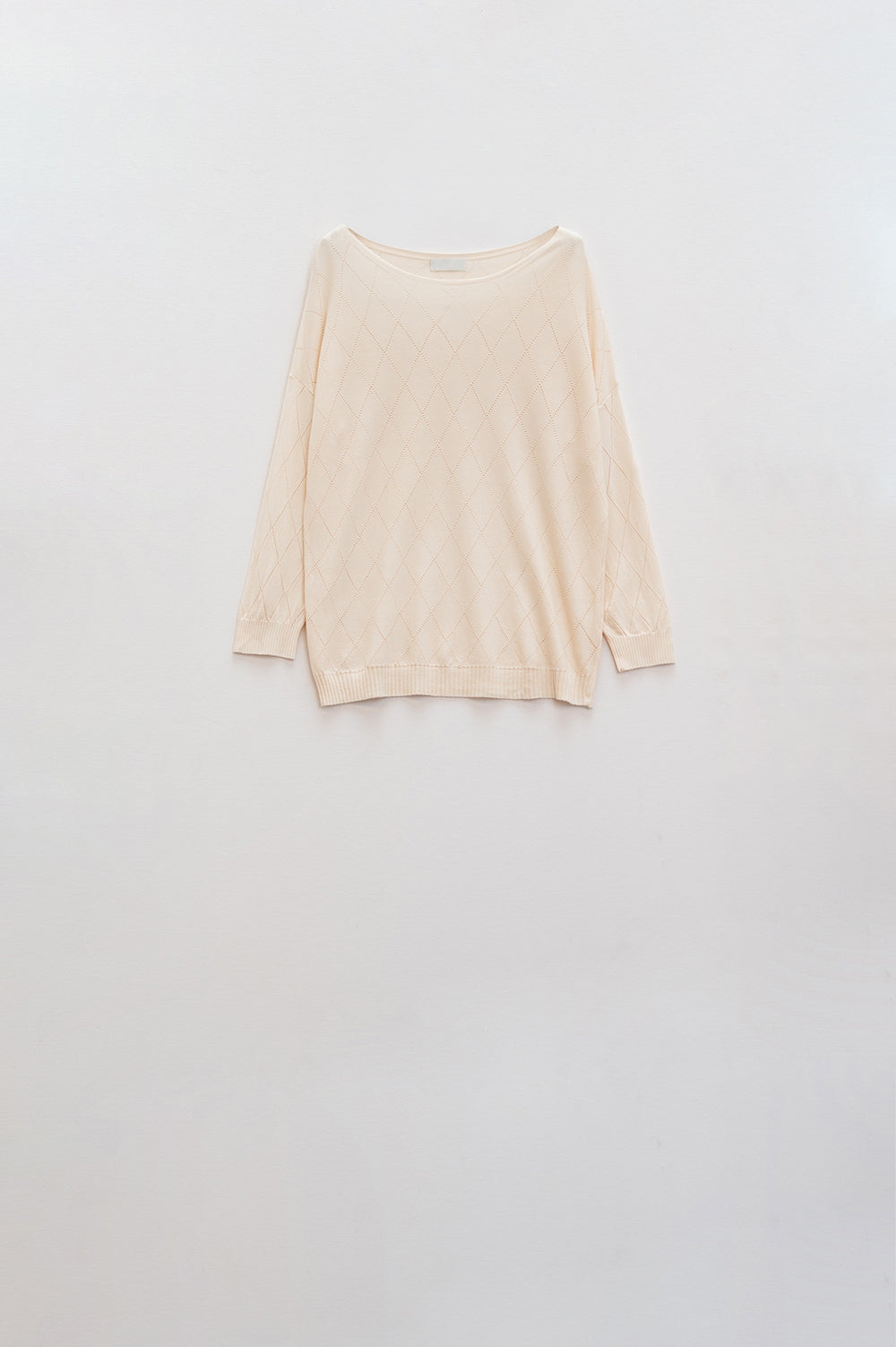 Beige sweater in argyle print with boat neck