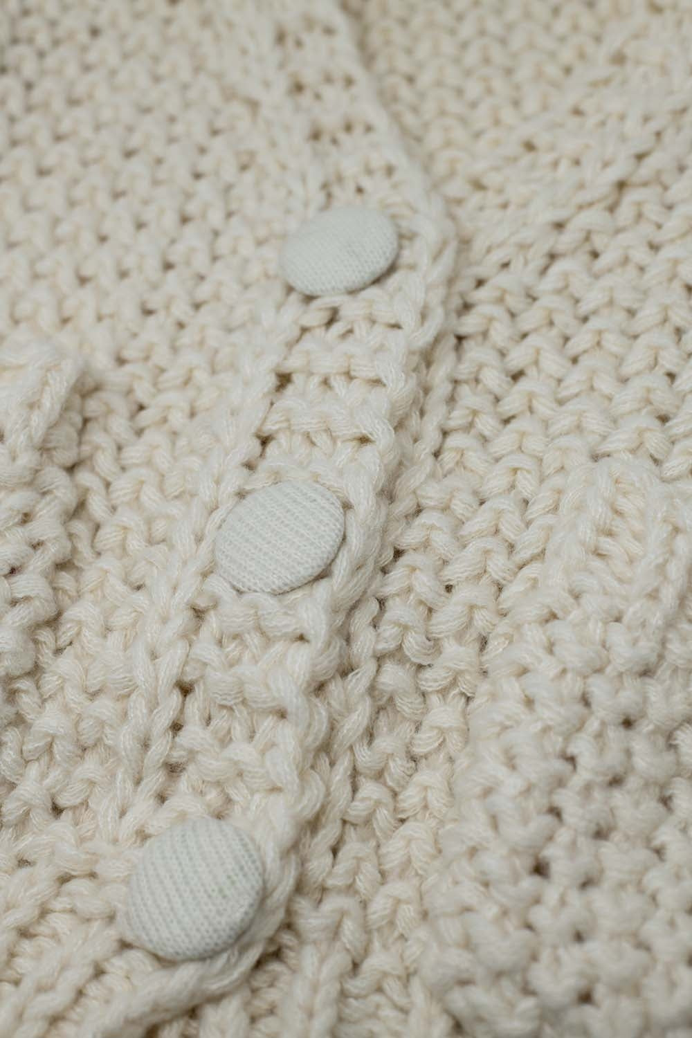 Oversized beige chunky knit jacket with pockets