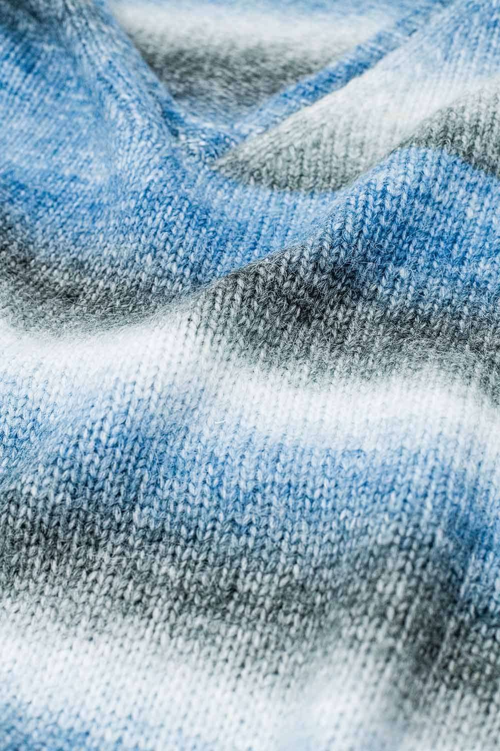 Loose V-neck sweater with blue and grey stripes