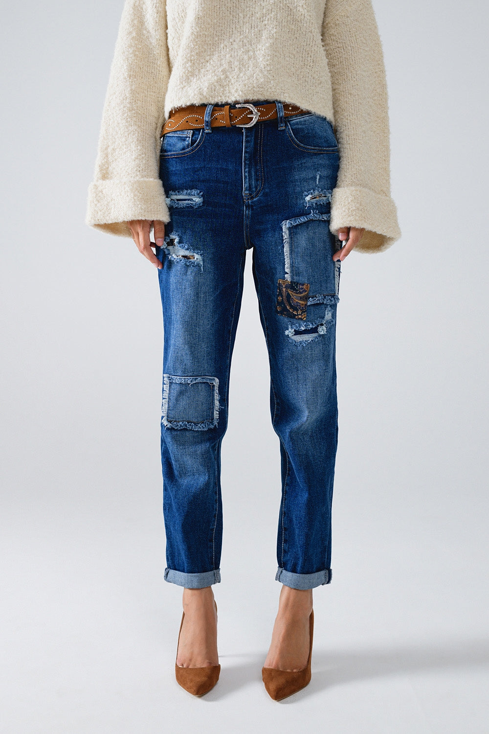 Loose blue jeans with subtle ripped design and patches - Denim