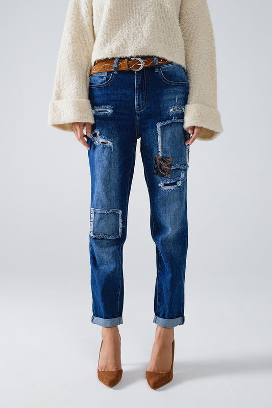 Loose blue jeans with subtle ripped design and patches - Denim