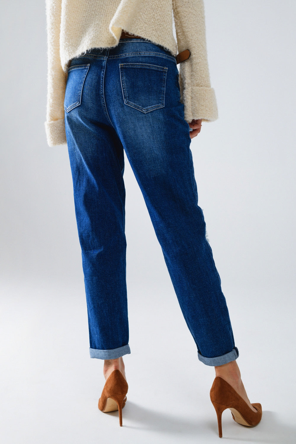 Loose blue jeans with subtle ripped design and patches - Denim