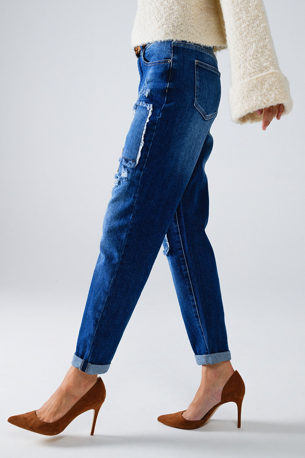 Loose blue jeans with subtle ripped design and patches - Denim