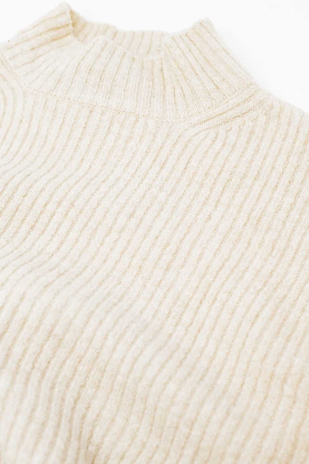 relaxed cream ribbed high neck sweater