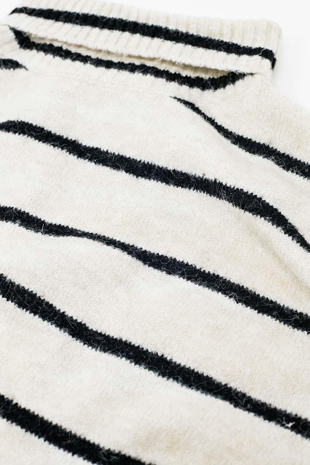 Cream striped sweater in black with high neck