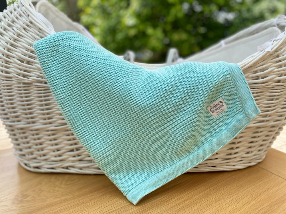 Couverture tricotée en coton biologique Aqua – 100 x 80 cm