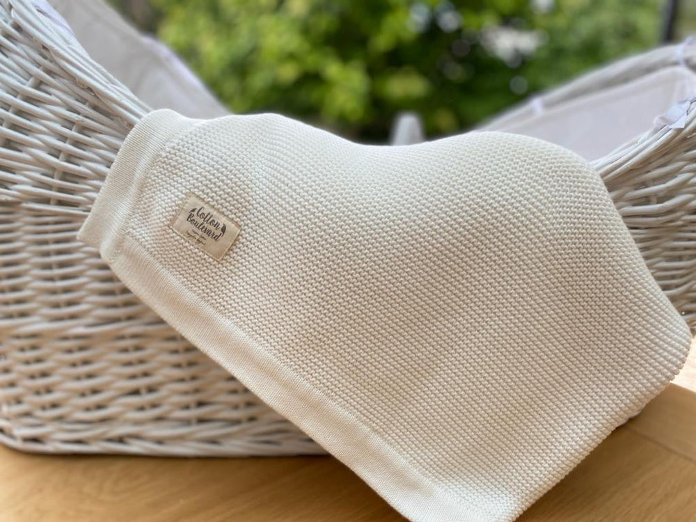 Couverture bébé en tricot de coton biologique blanc – 100 x 80 cm